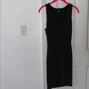 Subtle shimmering little black dress